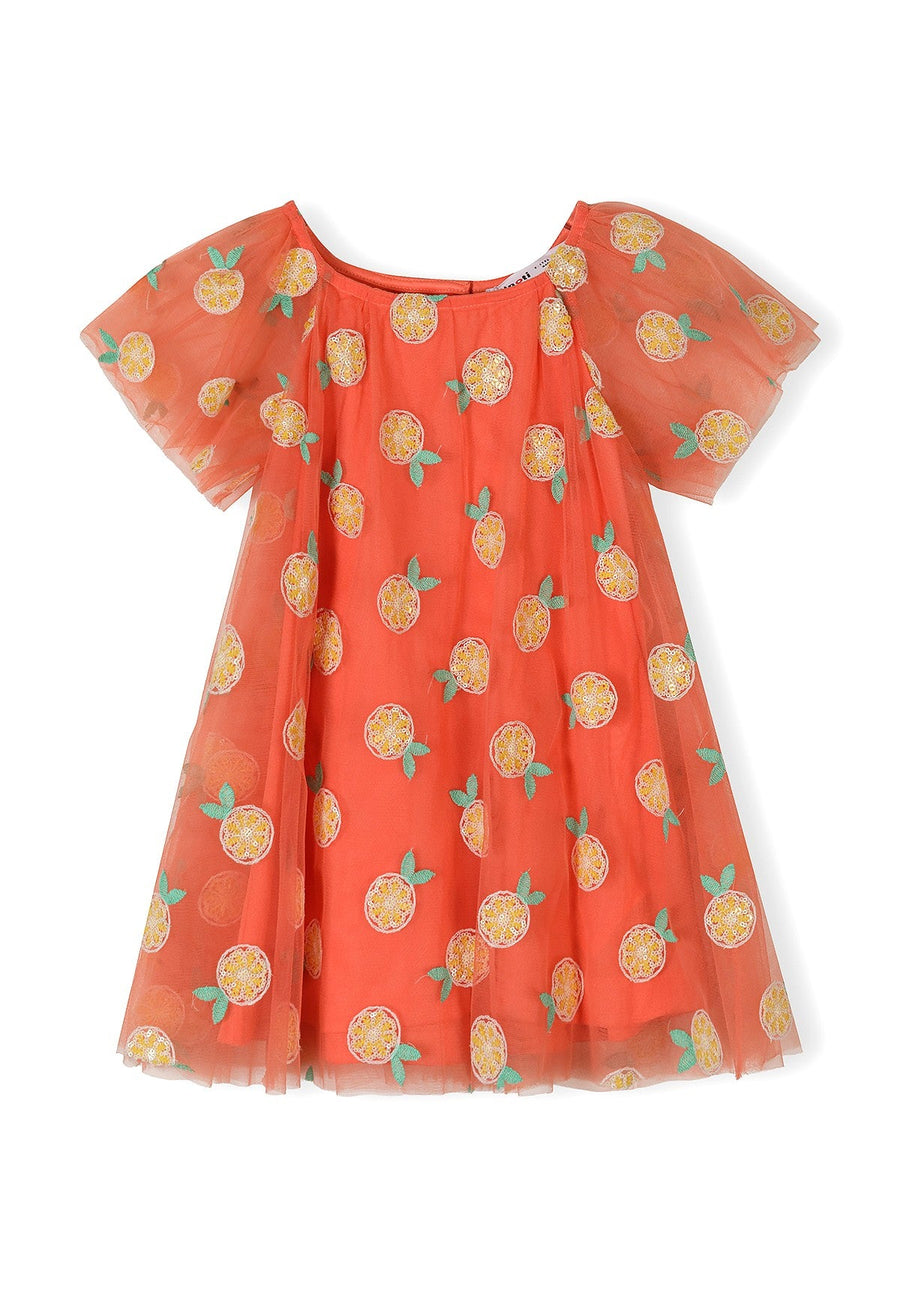 Orange tulle dress laid flat showing angel sleeves, sequin citrus print details, and full silhouette against white background