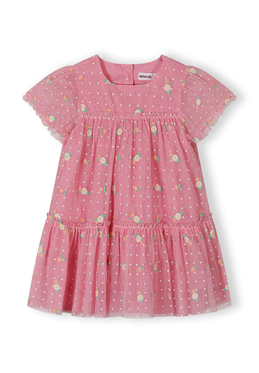 Front view of pink tulle dress showing button closure, floral embroidery details and tiered construction on white background