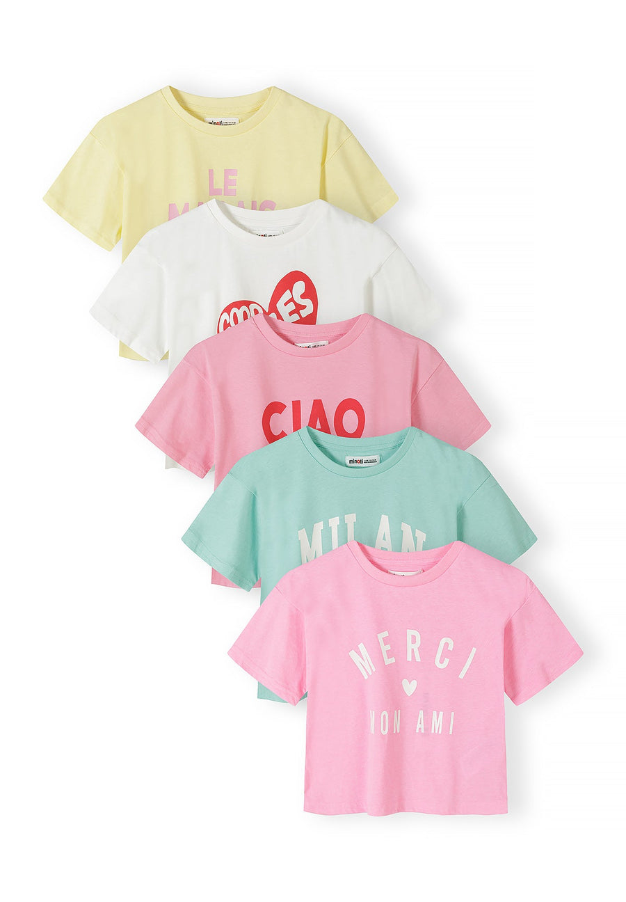 Stack of five cropped t-shirts in yellow, white, pink, mint green and light pink with graphic prints displayed on white background