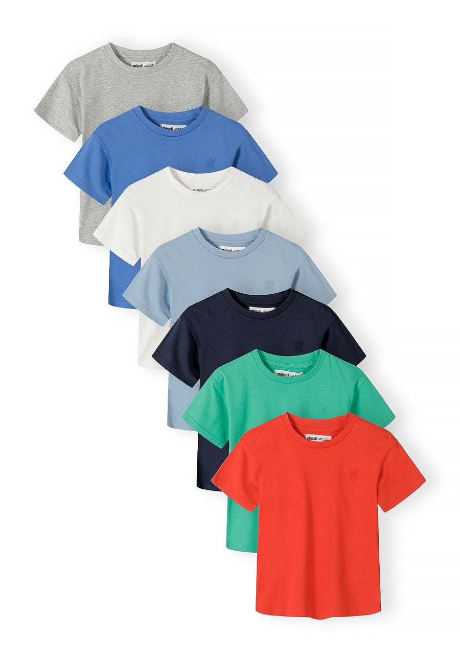 Seven cotton t-shirts in classic colours arranged in a cascading display showing grey, blue, white, light blue, navy, green and red