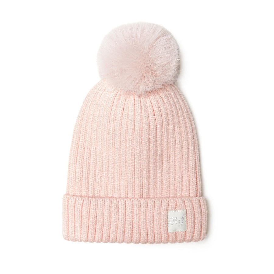 Light pink ribbed beanie with fluffy pom pom on white background, showing front view with lurex badge detail