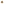 Beige fine knit cardigan with V-neck and button front closure shown flat against white background, displaying classic design and soft texture