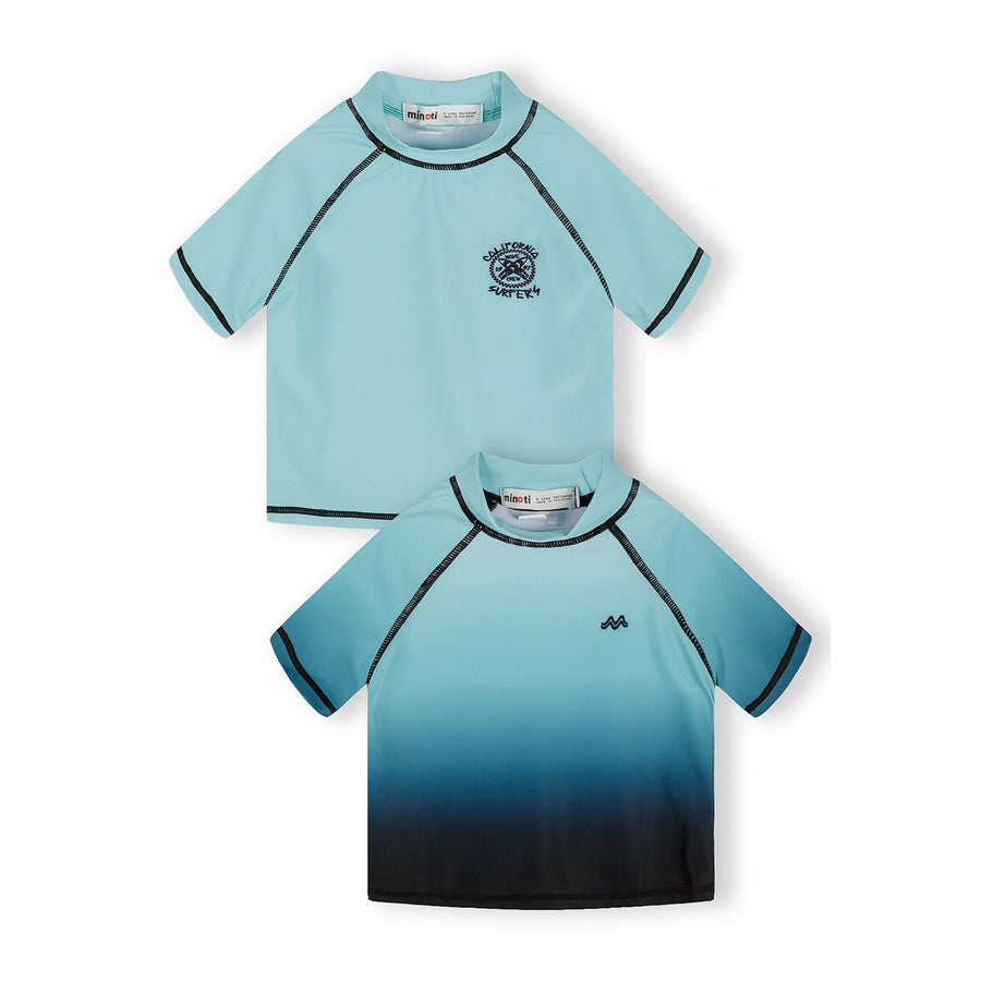 Two blue swim t-shirts laid flat showing light blue solid design with chest logo and blue gradient ombre style with mountain logo on white background