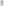 Young girl wearing turquoise tulle party dress with gold sequin polka dots, short sleeves, layered skirt, standing against white studio background