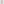 Young girl wearing blush pink pointelle knit set with button front cardigan and matching shorts, standing confidently against white background