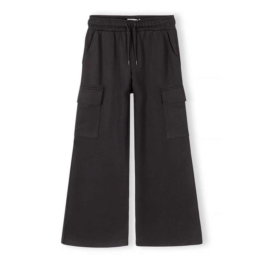 Black wide leg joggers with cargo pockets on white background, front view showing relaxed fit and drawstring waistband