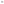 Close-up view of multicoloured striped cotton shorts showing rainbow pattern in pink, mint, yellow and white vertical stripes